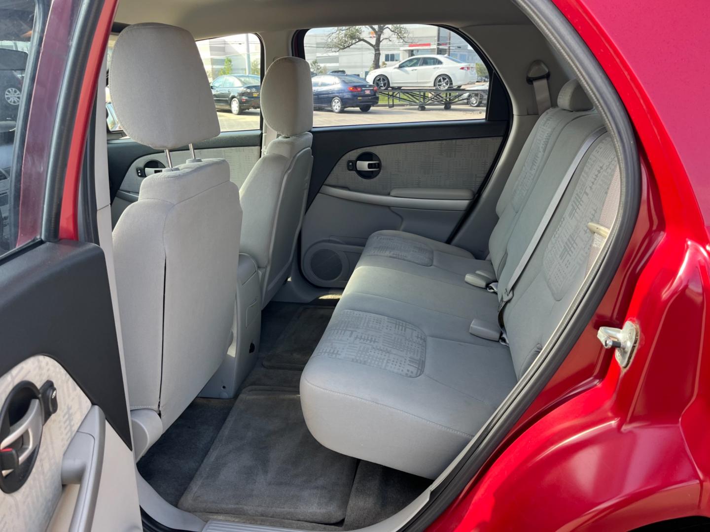 2006 red /TAN Chevrolet Equinox LS 2WD (2CNDL13F366) with an 3.4L V6 OHV 12V engine, 5-Speed Automatic transmission, located at 14700 Tomball Parkway 249, Houston, TX, 77086, (281) 444-2200, 29.928619, -95.504074 - Photo#9